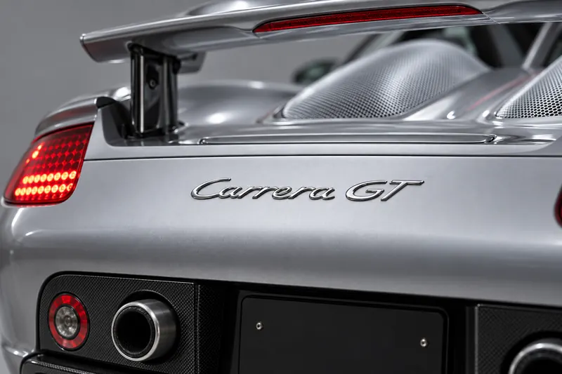 Close-up of the Carrera GT script badge on the rear deck